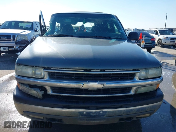 2002 Chevrolet Tahoe LT z VIN 1GNEC13Z42R319646, wystawiony jako IAAI lot #41623259 z przebiegiem 250 430 mil mil oraz . Historia ofert i sprzedaży dostępna na DreamBid. Obrazek 13.