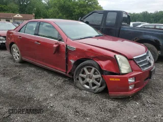 2009 Cadillac STS AWD z VIN 1G6DA67V190100207, wystawiony jako Copart lot #58911305 z przebiegiem Nie podano mil oraz Szkoda całkowita • Salvage title. Historia ofert i sprzedaży dostępna na DreamBid. Obrazek 4.