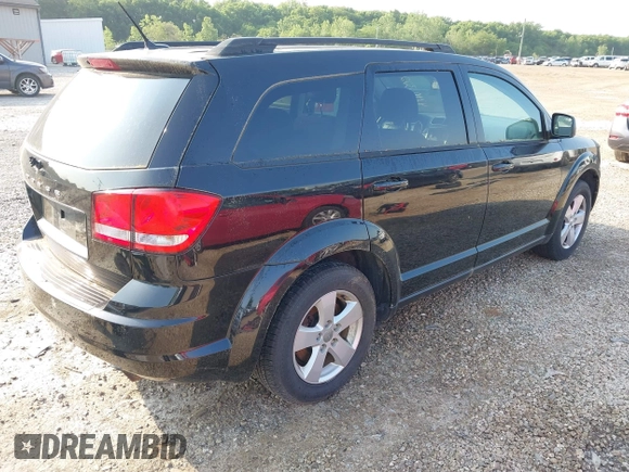 2013 Dodge Journey SE with VIN 3C4PDCAB9DT561701, listed as a IAAI auction lot 42403322 with 143,766 mi miles and . Bid and sale history available at DreamBid. Image 4.