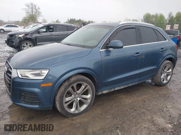 2016 Audi Q3 Premium Plus with VIN WA1EFCFSXGR015667, listed as a IAAI auction lot 42201938 with 133,359 mi miles and . Bid and sale history available at DreamBid. Image 2.
