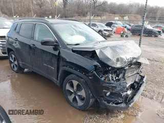 2020 Jeep Compass Latitude with VIN 3C4NJDBB1LT112676, listed as a IAAI auction lot 41651583 with 73,528 mi miles. Bid and sale history available at carsss.com. Image 1.
