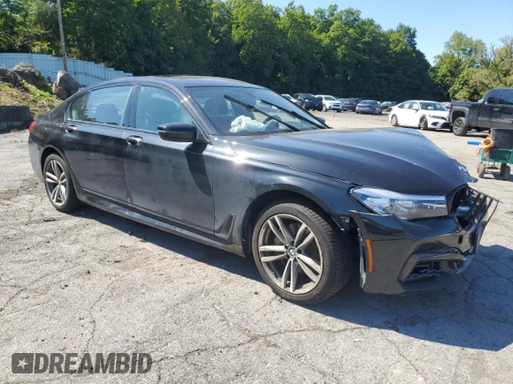 2017 BMW 7 Series 740i xDrive with VIN WBA7E4C54HGU99710, listed as a Copart auction lot 69572544 with 0 mi miles and Salvage Title. Bid and sale history available at carsss.com. Image 4.
