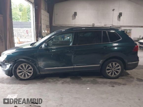 2018 Volkswagen Tiguan SEL with VIN 3VV2B7AX3JM133326, listed as a IAAI auction lot 42459190 with 94,665 mi miles and . Bid and sale history available at DreamBid. Image 14.