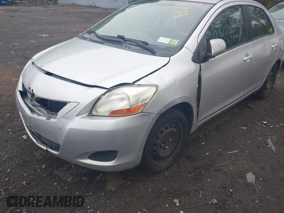 2009 Toyota Yaris with VIN JTDBT903494047486, listed as a IAAI auction lot 42173242 with 145,225 mi miles. Bid and sale history available at carsss.com. Image 6.
