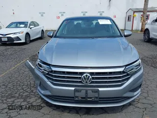 2019 Volkswagen Jetta S with VIN 3VWC57BU2KM215738, listed as a IAAI auction lot 42131376 with 52,720 mi miles and . Bid and sale history available at DreamBid. Image 12.