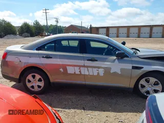 2018 Ford Police Interceptor with VIN 1FAHP2MKXJG114544, listed as a IAAI auction lot 42237695 with 100,824 mi miles and . Bid and sale history available at DreamBid. Image 13.