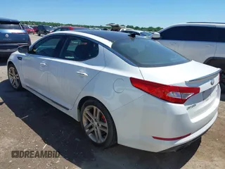 2013 Kia Optima SX z VIN 5XXGR4A67DG190723, wystawiony jako IAAI lot #42305393 z przebiegiem 139 668 mil mil oraz . Historia ofert i sprzedaży dostępna na DreamBid. Obrazek 3.