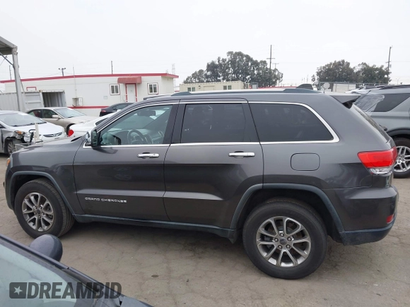 2014 Jeep Grand Cherokee Limited with VIN 1C4RJEBG0EC555774, listed as a IAAI auction lot 42160952 with 102,076 mi miles and . Bid and sale history available at DreamBid. Image 14.