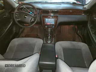 2015 Chevrolet Impala LS with VIN 2G1WA5E36F1171137, listed as a Copart auction lot 63060935 with 148,000 mi miles and Salvage title. Bid and sale history available at DreamBid. Image 8.