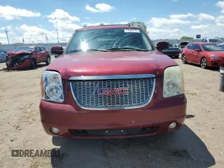 2007 GMC Yukon SLT z VIN 1GKFK13087J294570, wystawiony jako Copart lot #57968375 z przebiegiem 185 186 mil mil oraz Czysty tytuł • Clean title. Historia ofert i sprzedaży dostępna na DreamBid. Obrazek 5.