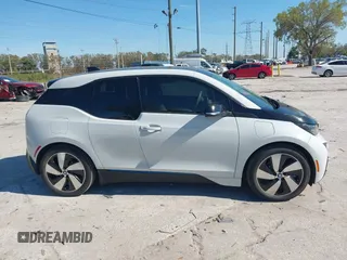 2017 BMW i3 z VIN WBY1Z8C55HV550906, wystawiony jako IAAI lot #41705056 z przebiegiem 79 566 mil mil oraz . Historia ofert i sprzedaży dostępna na DreamBid. Obrazek 13.