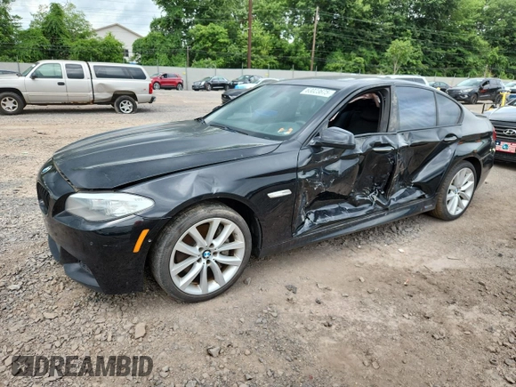 2013 BMW 5 Series 550i xDrive with VIN WBAFU9C55DDY72065, listed as a Copart auction lot 63023675 with 117,592 mi miles and Salvage title. Bid and sale history available at DreamBid. Image 1.