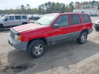 1996 Jeep Grand Cherokee Laredo with VIN 1J4FX58S4TC346218, listed as a IAAI auction lot 41943268 with 138,431 mi miles and . Bid and sale history available at DreamBid. Image 17.