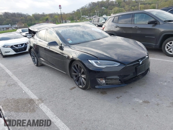 2017 Tesla Model S 100D with VIN 5YJSA1E28HF188981, listed as a IAAI auction lot 42010115 with 76,327 mi miles and . Bid and sale history available at DreamBid. Image 1.