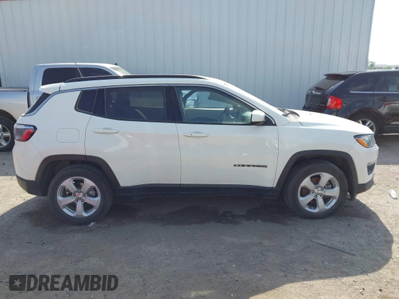 2021 Jeep Compass Latitude with VIN 3C4NJCBBXMT563942, listed as a IAAI auction lot 42045108 with 166,153 mi miles and . Bid and sale history available at DreamBid. Image 13.