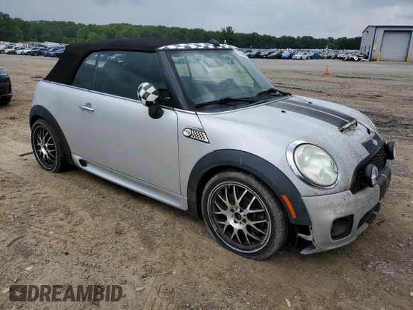2011 MINI Convertible S z VIN WMWZP3C51BTX84117, wystawiony jako Copart lot #57636385 z przebiegiem 130 700 mil mil oraz Szkoda całkowita • Salvage title. Historia ofert i sprzedaży dostępna na DreamBid. Obrazek 4.