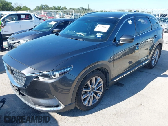2020 Mazda CX-9 Grand Touring with VIN JM3TCADY1L0417651, listed as a IAAI auction lot 42334867 with 105,236 mi miles and . Bid and sale history available at DreamBid. Image 17.