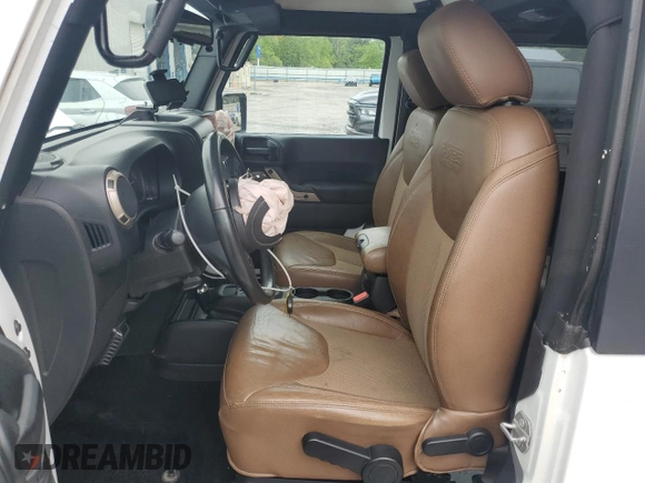 2016 Jeep Wrangler Sahara z VIN 1C4AJWBG3GL286692, wystawiony jako Copart lot #51988555 z przebiegiem 109 764 mil mil oraz Szkoda całkowita • Salvage title. Historia ofert i sprzedaży dostępna na DreamBid. Obrazek 7.
