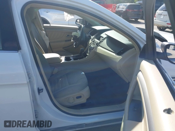 2014 Ford Taurus SE с VIN 1FAHP2D89EG128381, выставлен на аукционе IAAI как лот 42379885 с пробегом 34 937 миль миль и . История ставок и продаж доступна на DreamBid. Изображение 5.