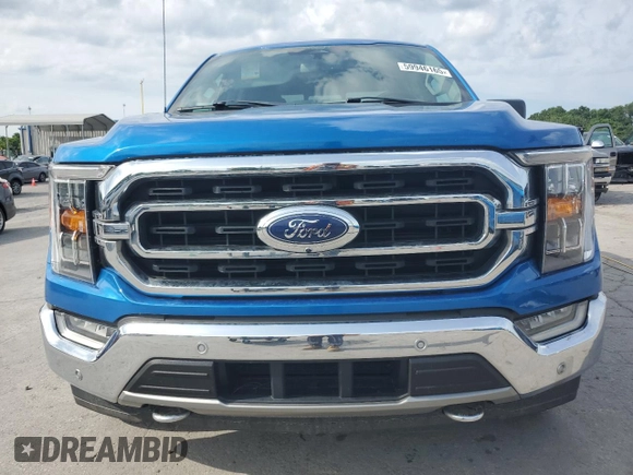 2021 Ford F-150 XL с VIN 1FTEW1EP7MFA68430, выставлен на аукционе Copart как лот 59946165 с пробегом 69 334 миль миль и Списание • Salvage title. История ставок и продаж доступна на DreamBid. Изображение 5.