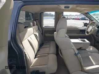 2005 Ford F-150 XLT with VIN 1FTPX12505NB28550, listed as a IAAI auction lot 41381125 with 248,711 mi miles. Bid and sale history available at carsss.com. Image 8.