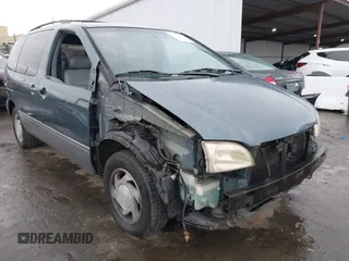 2001 Toyota Sienna LE with VIN 4T3ZF13C01U323995, listed as a IAAI auction lot 41472484 with 232,667 mi miles. Bid and sale history available at carsss.com. Image 6.