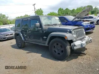 2015 Jeep Wrangler Unlimited Freedom with VIN 1C4HJWDG0FL598947, listed as a Copart auction lot 61794214 with 125,778 mi miles and Salvage title. Bid and sale history available at DreamBid. Image 11.