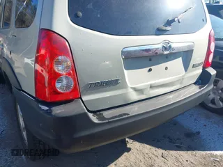 2006 Mazda Tribute i with VIN 4F2YZ92Z66KM10050, listed as a IAAI auction lot 41346153 with 139,668 mi miles and . Bid and sale history available at carsss.com. Image 6.