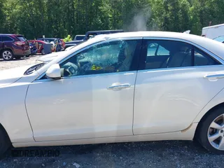 2013 Cadillac ATS with VIN 1G6AA5RX2D0150988, listed as a IAAI auction lot 42538612 with 212,037 mi miles and . Bid and sale history available at DreamBid. Image 14.