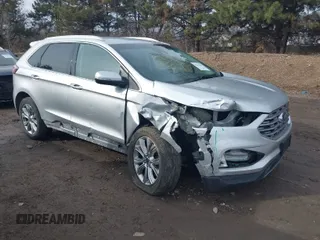 2019 Ford Edge Titanium with VIN 2FMPK4K97KBC27890, listed as a IAAI auction lot 41553163 with 103,750 mi miles. Bid and sale history available at carsss.com. Image 1.