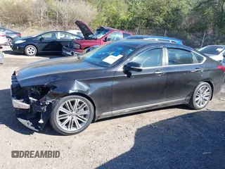 2018 Genesis G80 3.8L with VIN KMHGN4JE0JU265072, listed as a IAAI auction lot 41596549 with 121,502 mi miles. Bid and sale history available at carsss.com. Image 14.