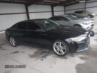 2014 Audi A6 Premium Plus with VIN WAUGFAFC1EN164580, listed as a IAAI auction lot 42220550 with 112,528 mi miles and . Bid and sale history available at DreamBid. Image 13.