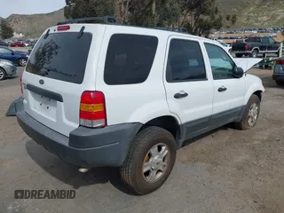 2004 Ford Escape XLT with VIN 1FMYU03134KA80217, listed as a IAAI auction lot 41672764 with 184,601 mi miles. Bid and sale history available at carsss.com. Image 4.