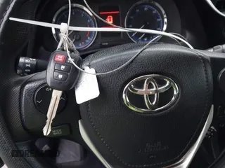 2018 Toyota Corolla L z VIN 5YFBURHE7JP831763, wystawiony jako IAAI lot #41539485 z przebiegiem 95 495 mil mil oraz . Historia ofert i sprzedaży dostępna na DreamBid. Obrazek 11.