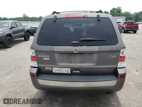 2011 Mercury Mariner Premier z VIN 4M2CN8HG8BKJ07653, wystawiony jako Copart lot #57495725 z przebiegiem 105 624 mil mil oraz Szkoda całkowita • Salvage title. Historia ofert i sprzedaży dostępna na DreamBid. Obrazek 6.