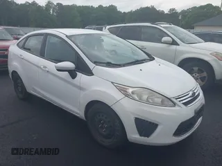 2011 Ford Fiesta SE z VIN 3FADP4BJ5BM207435, wystawiony jako IAAI lot #42216633 z przebiegiem 147 812 mil mil oraz . Historia ofert i sprzedaży dostępna na DreamBid. Obrazek 1.