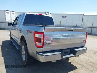 2021 Ford F-150 XL with VIN 1FTFW1E81MFA28258, listed as a IAAI auction lot 42402411 with 119,492 mi miles and . Bid and sale history available at DreamBid. Image 3.