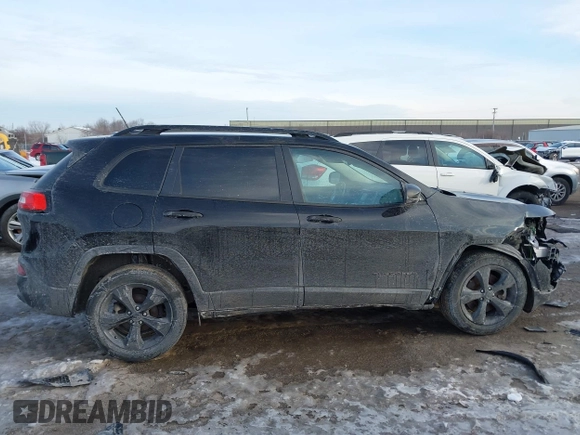 2017 Jeep Cherokee Altitude with VIN 1C4PJLAB1HW644077, listed as a IAAI auction lot 41643091 with 120,738 mi miles and . Bid and sale history available at DreamBid. Image 13.