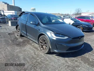 2022 Tesla Model X with VIN 7SAXCDE52NF345835, listed as a IAAI auction lot 41823522 with 24,401 mi miles and . Bid and sale history available at DreamBid. Image 1.