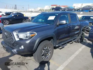 2020 Toyota Tacoma SR5 with VIN 3TMCZ5AN2LM351472, listed as a IAAI auction lot 41621286 with 48,402 mi miles and . Bid and sale history available at DreamBid. Image 18.