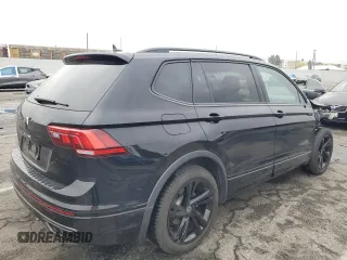 2023 Volkswagen Tiguan SE R-Line Black z VIN 3VVCB7AXXPM033818, wystawiony jako Copart lot #48759425 z przebiegiem 24 260 mil mil oraz Szkoda całkowita • Salvage title. Historia ofert i sprzedaży dostępna na DreamBid. Obrazek 3.