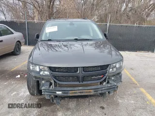 2019 Dodge Journey SE with VIN 3C4PDCBG2KT738516, listed as a IAAI auction lot 41112993 with 201,908 mi miles and . Bid and sale history available at DreamBid. Image 12.