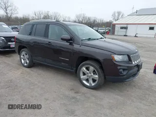 2014 Jeep Compass Latitude with VIN 1C4NJDEB5ED731057, listed as a IAAI auction lot 41938769 with 175,289 mi miles and . Bid and sale history available at carsss.com. Image 1.