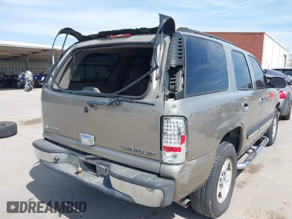2003 Chevrolet Tahoe LS with VIN 1GNEC13V23R141539, listed as a IAAI auction lot 41812195 with 486,815 mi miles. Bid and sale history available at carsss.com. Image 18.