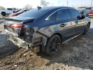 2024 Honda Civic Sedan Touring with VIN 2HGFE1F92RH325802, listed as a Copart auction lot 43206405 with 22,850 mi miles and Salvage Title. Bid and sale history available at carsss.com. Image 3.