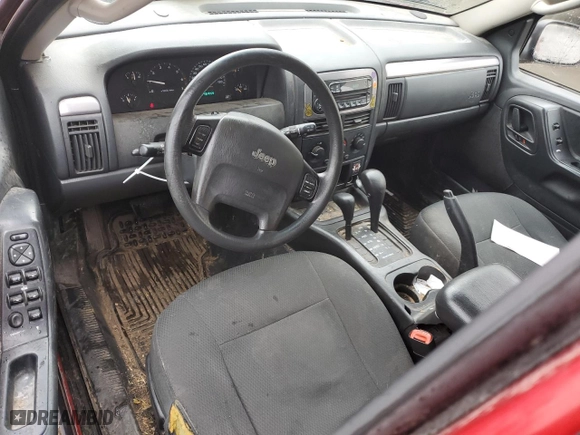 2003 Jeep Grand Cherokee Laredo with VIN 1J4GW48SX3C531892, listed as a Copart auction lot 43029375 with 246,444 mi miles and Salvage Title. Bid and sale history available at carsss.com. Image 8.