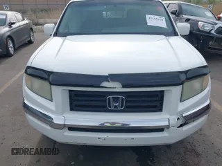 2006 Honda Ridgeline RTL z VIN 2HJYK16586H519593, wystawiony jako IAAI lot #42111678 z przebiegiem 244 962 mil mil oraz . Historia ofert i sprzedaży dostępna na DreamBid. Obrazek 12.