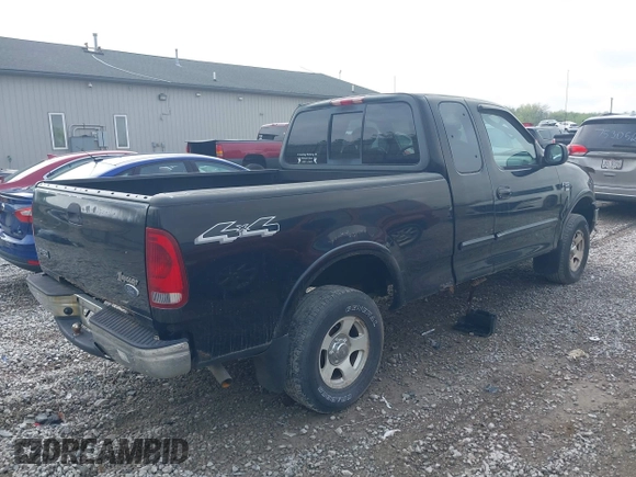 2003 Ford F-150 XL with VIN 2FTRX18W73CA80587, listed as a IAAI auction lot 42119924 with 222,990 mi miles. Bid and sale history available at carsss.com. Image 4.