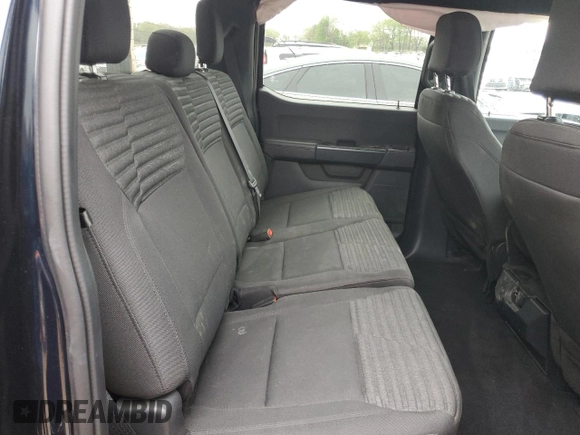 2023 Ford F-150 XL with VIN 1FTEW1EP5PKF67674, listed as a Copart auction lot 50348795 with 23,176 mi miles and Salvage title. Bid and sale history available at DreamBid. Image 11.