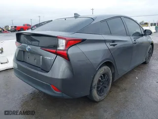 2019 Toyota Prius L Eco with VIN JTDKARFU3K3099256, listed as a IAAI auction lot 41813619 with 169,900 mi miles. Bid and sale history available at carsss.com. Image 4.